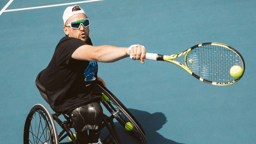 Dylan Alcott playing tennis